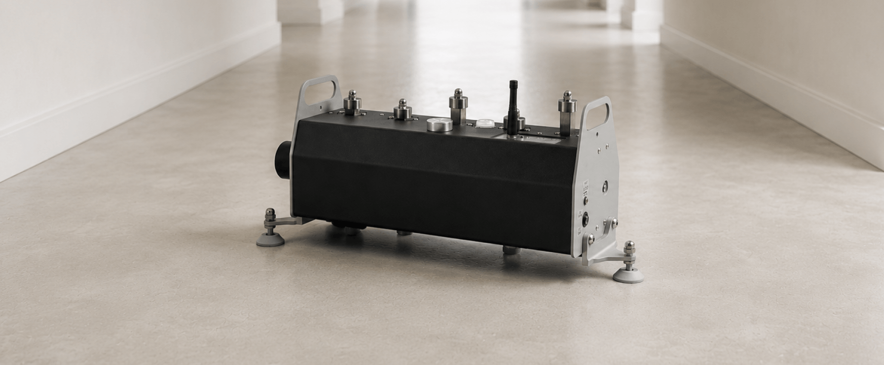 Impact noise tapping machine on a timber floor during Part E sound insulation testing